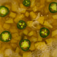 Pineapple chunks and jalapeño slices in brine