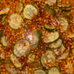 Sliced spicy garlic dill pickles as crinkle cut pickle chips